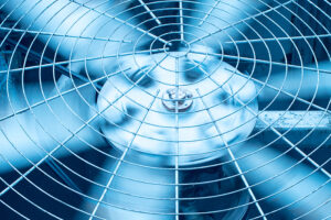 Up close of air conditioner unit fan.